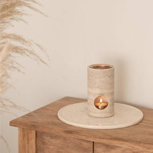 Travertine Stone Oil Burner with a candle and rose gold tray travertine stone place mat plate on wooden table and feathers with cream white wall - Sumac Store